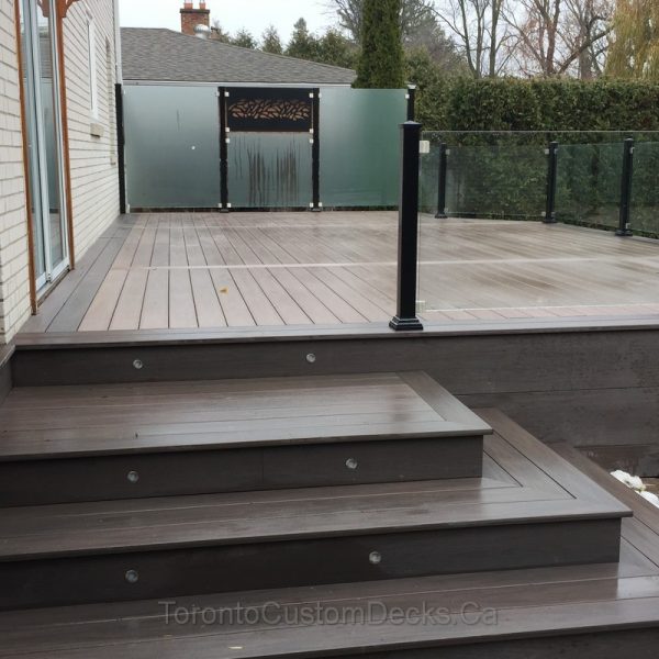 Composite deck with glass railings Toronto Custom deck design